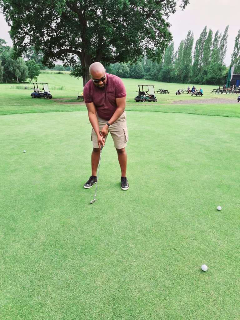 Male playing golf